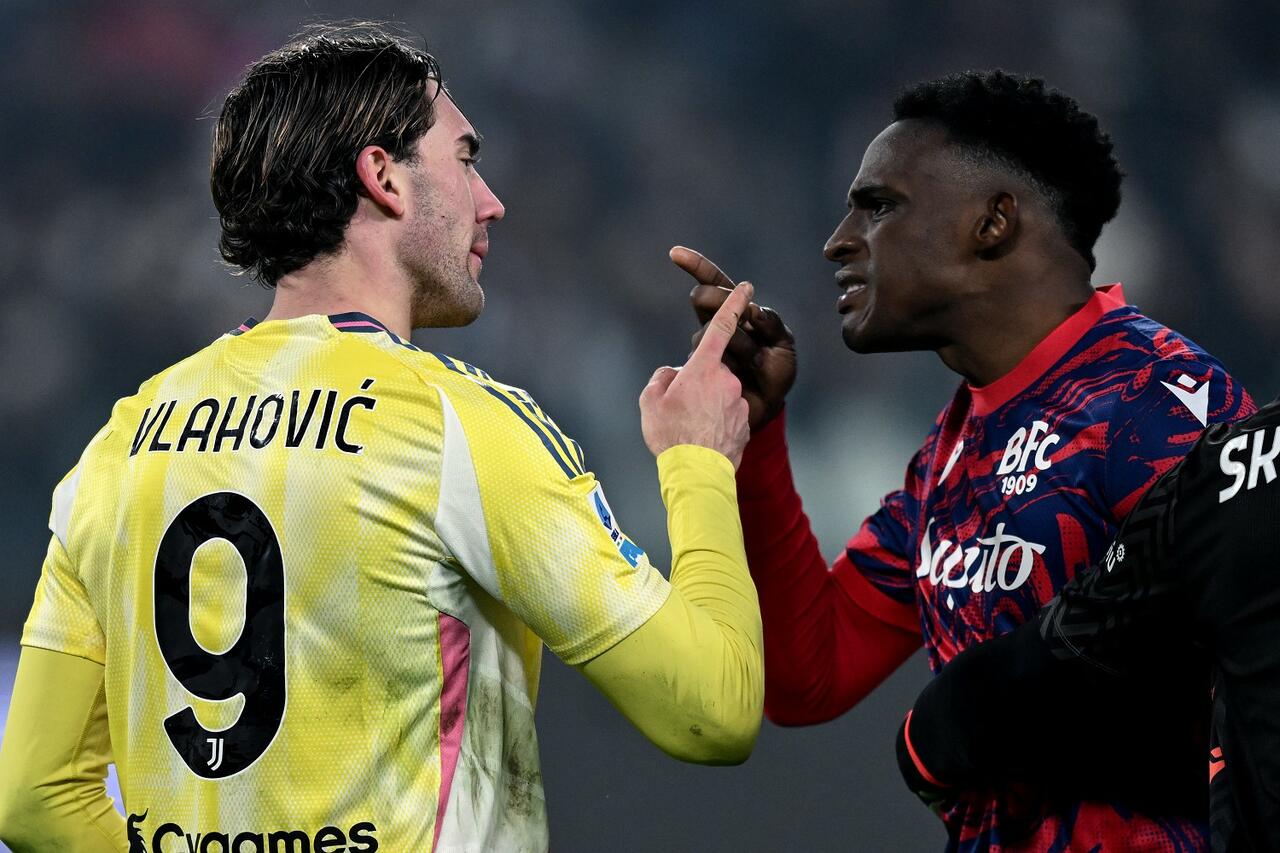 Jhon Lucumì e Dusan Vlahovic